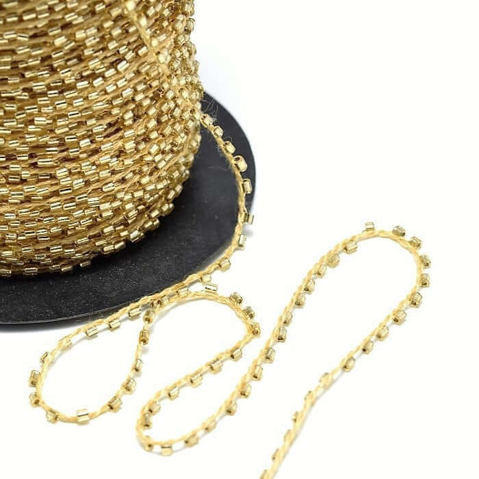 Vente au détail 2 mètre de Cordon perlé très fin doré perle rocaille tube en polyester 1 mm et perles de 2 mm pour bijoux cordon