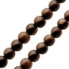 Vente Perles rondes en bois d'ébene tigré sur fil 8mm (1)