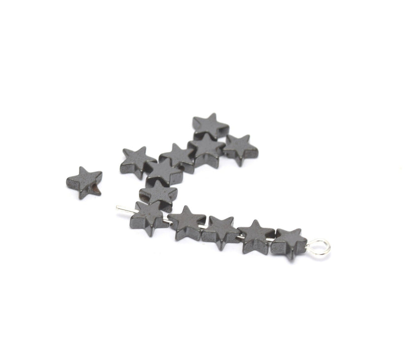 Acheter en gros perles x10 étoiles noir hématite 2x4 mm, trou: 2 mm lot de 10 perles étoiles