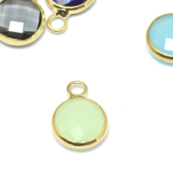 Creez avec 1 pendentif or 12x9x5 mm, Trou: 2 mm et verre à facettes vert pastel opaque avec contours dorés