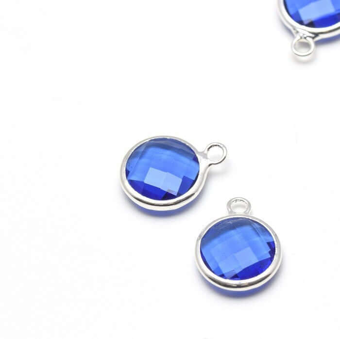 Achat au détail 1 pendentif argent 14x11x5 mm, Trou: 2 mm et verre à facettes bleu saphir avec contours argentés